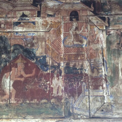 Old mural that are in an incomplete condition inside Wat Phra That Lampang Luang, Thailand