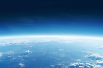 Naklejka na ściany i meble view from the space to the blue earth's surface with atmospheric haze and clouds