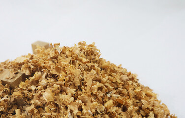 Wood sawdust white background.