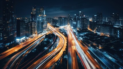 Blur in the movement of car lights on the roads of the night city. Abstract panoramic background
