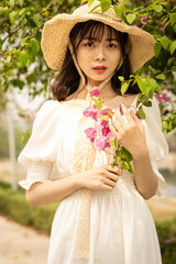 portrait of a girl in a straw hat