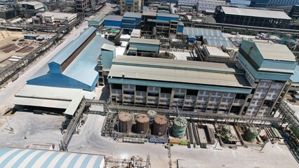 Chemical energy industry site power manufacturing factory pipe gas line top drone view smoke air pollution