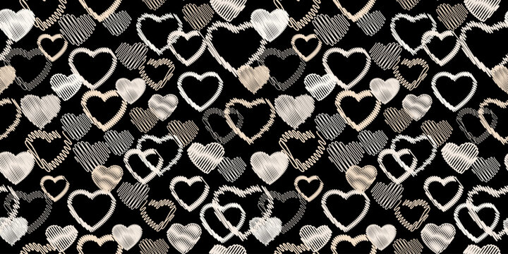 Seamless simple pattern with light beige hearts on a black background. Vector hand drawn sketch. Print with set textured hearts silhouettes. Valentine, love background. Design for fashion, fabric