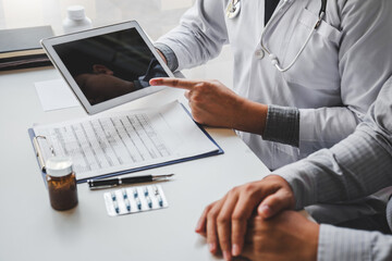 Medical technology, Doctor cardiologist discusses diagnosis with patient.