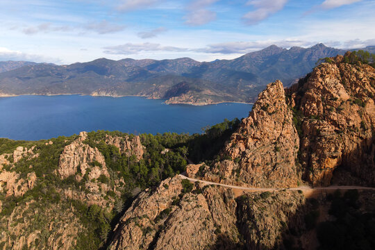 The winding roads which cross the magnificent creeks of Piana, a listed UNESCO World Heritage site in Corsica, France.