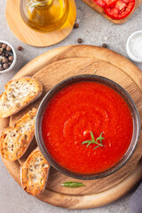 Tomato soup or sauce with rosemary.  Healthy, vegan and dieting lunch and dinner concept. Gazpacho. 