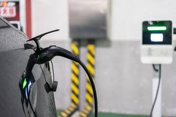 electric car charging in station