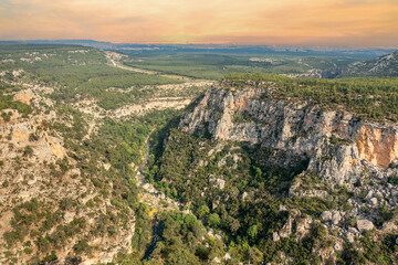 Aerial drone view of Güver canyon, covered with steep cliffs and pine trees. Antalya - TURKEY