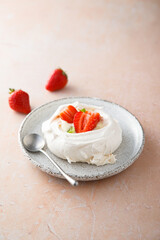 Traditional Pavlova dessert with fresh strawberry