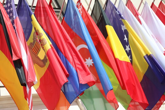 flags of some nations of the world fly together