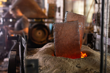 Foundry - ferrous metal is melted in an induction furnace of metallurgical plant