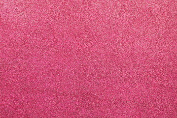 red glittery background with shimmering reflections, ideal as a backdrop for Christmas