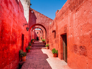Stunning architectures of the ancient Santa Catalina monastery with bright red walls, Arequipa, Peru - 684161479