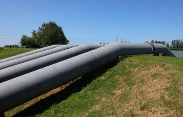 pipes from the Idrovore for drying out canals to avoid river flooding and to water the fields in...