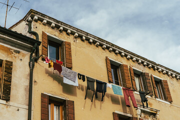 Fototapeta na wymiar Drying clothes on clotheslines in Venice, Italy