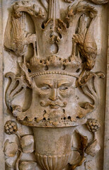 Fototapeta na wymiar bas relief on the wall, Interior of the Palace, Urbino, Marche, Italy