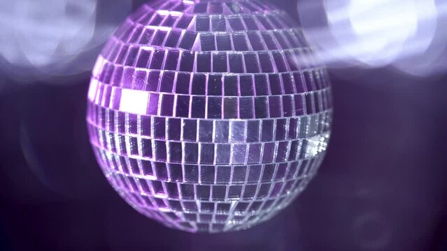 Spinning Silver disco ball. Disco party glowing animation. VJ animation. Glittering silver Disco Ball for party celebrations. 