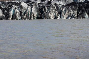 Solheimajokull detail, a glacier tongue of the Myrdalsjokull glacier. Mýrdalsjökull is a glacier in the south of the Icelandic highlands. The glacier covers the great Katla, an active volcano.