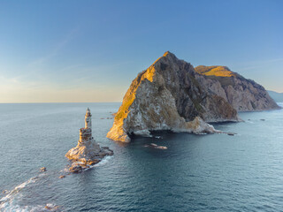 Aerial View The abandoned lighthouse Aniva in Sakhalin Island,Russia. Sunset.
