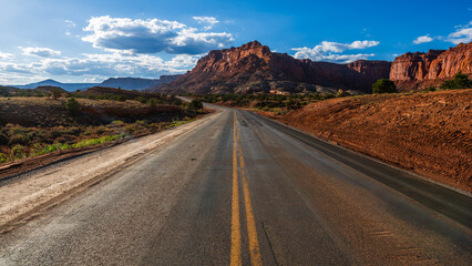 Fototapeta premium Utah State Route 24 leading through the Capitol Reef national park in Utah. 