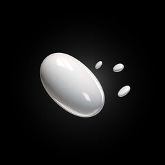 White pills on black background 