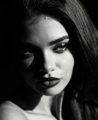 Fototapeta premium A black and white photo of a woman. Generative AI Image.