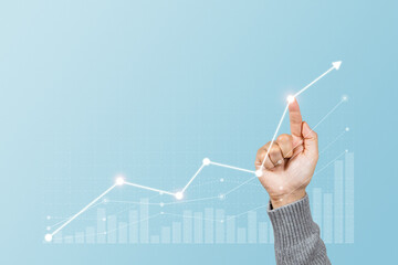Man is touching arrows pointing up with graph as a symbol of growth and success or rising successful development and business development in the future - obrazy, fototapety, plakaty