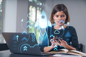 Pensive attractive beautiful businesswoman in formal wear working on laptop at office workplace in...