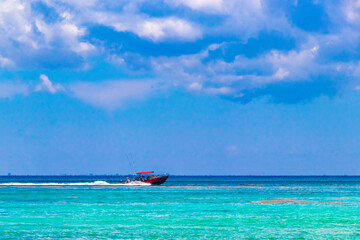 Boats yachts ship catamaran jetty beach Playa del Carmen Mexico.