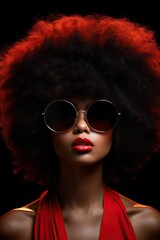 Professional Photo of a Young Dark Skinned Woman Wearing Sunglases in a Simple Black Room Showing off Her Long Dark Brown Curly Afro Hair. 