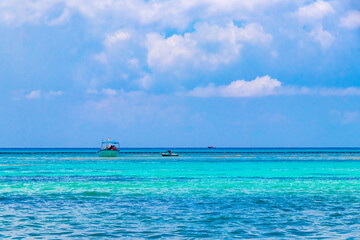 Boats yachts ship catamaran jetty beach Playa del Carmen Mexico.
