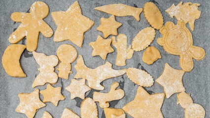 Christmas cookies on parchment dough