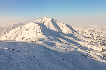 Fototapeta na wymiar scenic view of Maigashkan mountain from Amirsoy ski resort (Tashkent region, Uzbekistan)