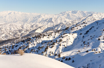 fresh powder on the slopes of Amirsoy mountain resort (Tashkent region, Uzbekistan)