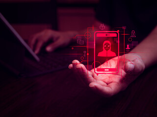 Mobile phone scam, scammer stealing data, digital identity thief, dark web, text sms fraud online concepts. Hacker symbol on smartphone with personal data icon near person hand with laptop computer.