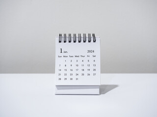 A January 2024 calendar desk for the organizer to plan and reminder isolated on white background,...