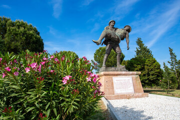 Canakkale / Turkey, May 26, 2019 / Monument of a Turkish soldier carrying wounded Anzac soldier at...