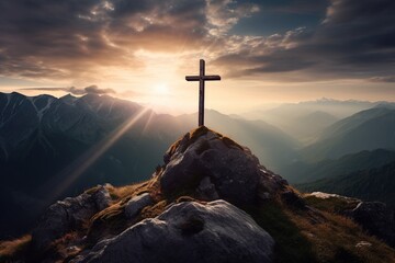 Wooden cross on the top of the mountain with clouds on the background - obrazy, fototapety, plakaty