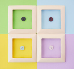 four frames with buttons on a multi-colored background