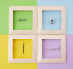 four frames with spare parts on a multi-colored background