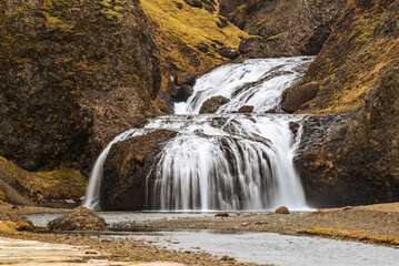 Long exposure shot of Stjórnarfoss waterfall, next to Kirkjubæjarklaustur, Southern Region, Iceland