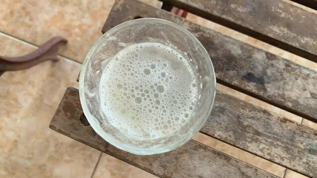 Tuak Manis (Arak) or Palm Wine in a glass. Traditional drinks popular in Indonesia.