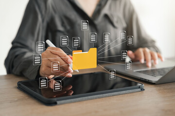 Document management system concept, business woman using laptop, folders and document icon...