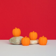 The wax melts in the shape of a pumpkin.