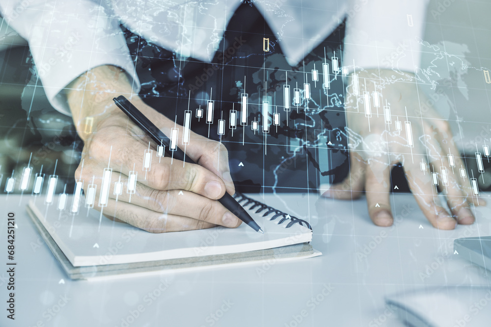 Poster double exposure of abstract creative financial diagram with world map and with hand writing in notep