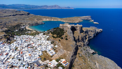 The Acropolis of Lindos in Rhodes island Greece. Saint Paul's Beach and Lindos Acropolis aerial...