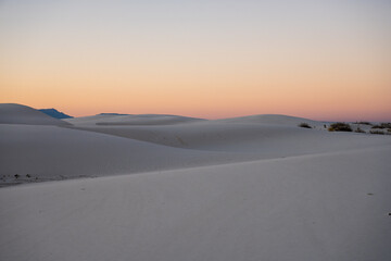 Shadows and Light Of Sand Dunes Against Fading Light Of Sunset