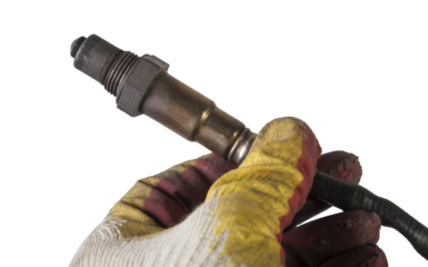 Lambda probe - oxygen sensor device designed to record amount of remaining oxygen in the exhaust gas of car engine is located in exhaust system. Metal spare part for replacement to repair in workshop.