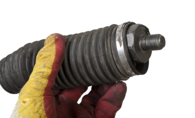 Used car ball joint isolated on white background Ball joint is the assembly connecting the steering wheel hub and the suspension arm, spherical bearing