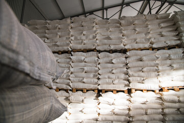 Food warehouse. Bags of rice, sugar, flour and other products.